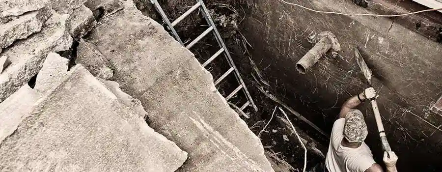 Exterior Basement Wall prepped for water proofing.
