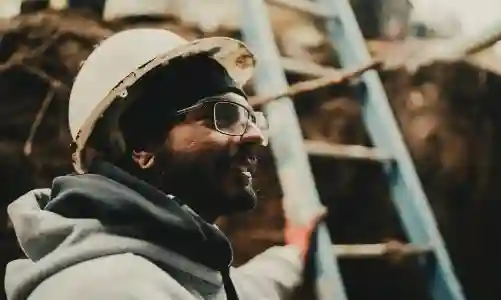 McCoy Contractors happy worker - foundation repair team member Milwaukee