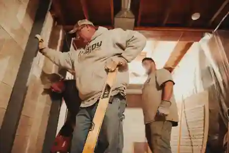 McCoy Contractors foundation repair team looking on Milwaukee