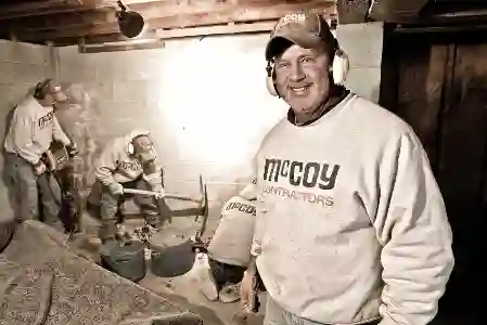 McCoy Contractors foreman and crew working on foundation repair - professional team Milwaukee