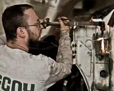 McCoy Contractors trucks being repaired in shop - foundation repair equipment maintenance Milwaukee