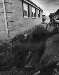 Foundation wall support beam installation by McCoy Contractors - structural foundation support